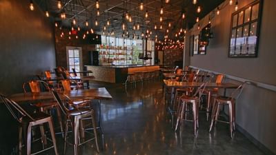 tables and chairs in a bar and grill