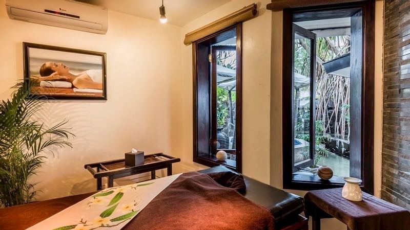 Interior of a room with a massage bed in a Spa at Warwick Fiji