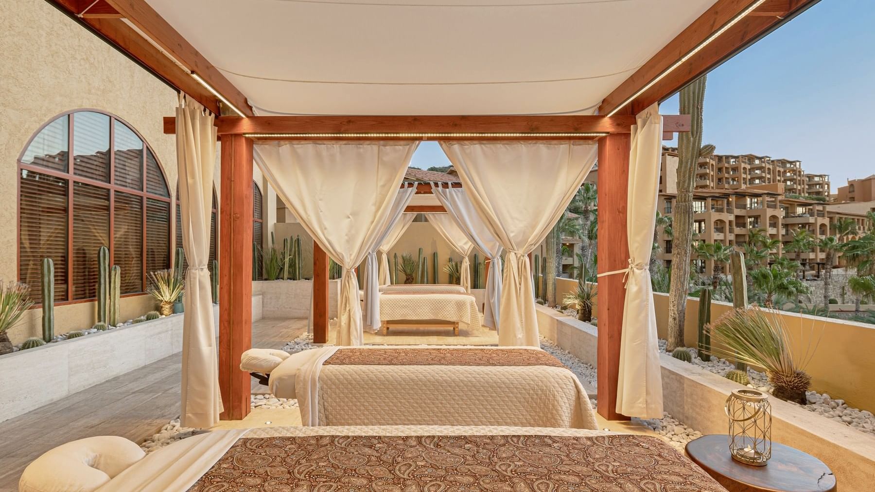 Outdoor massage cabin with spa beds & ocean view at Grand Fiesta Americana