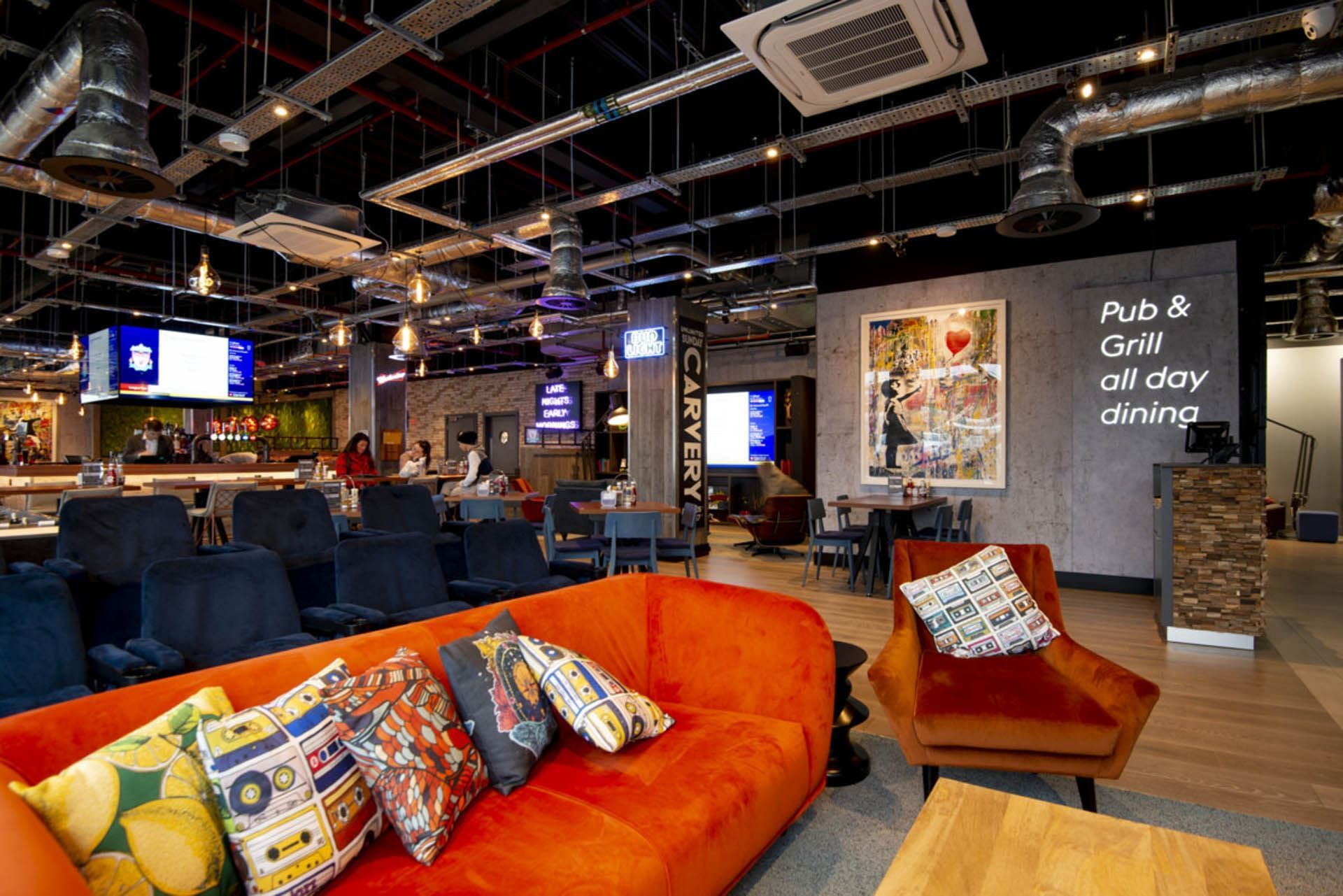 Lounge & dining area in Pub & Grill at Village Hotels