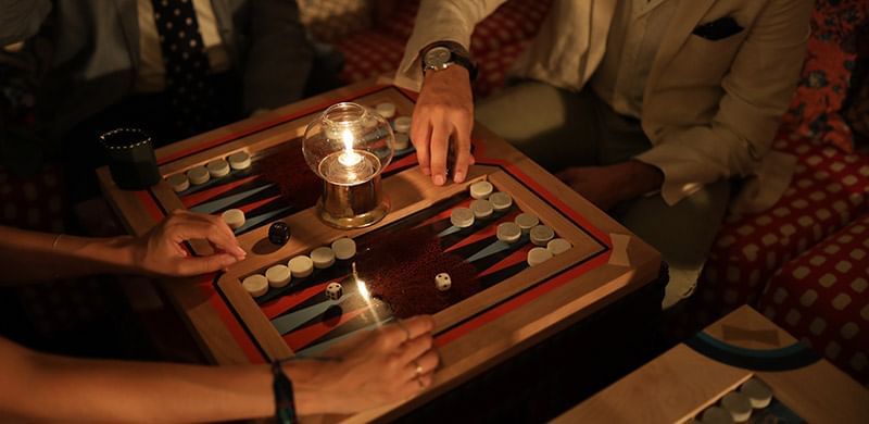 Closeup on guests playing board Games at Marbella Club