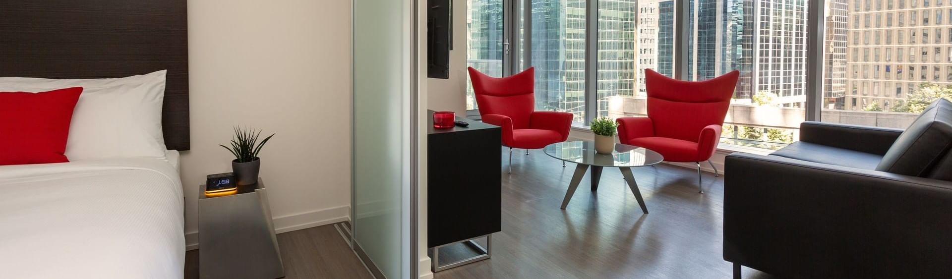 Hotel suite with a bedroom and living room at ReStays Ottawa