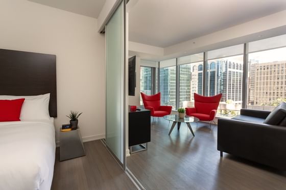 Hotel suite with a bedroom and living room at ReStays Ottawa