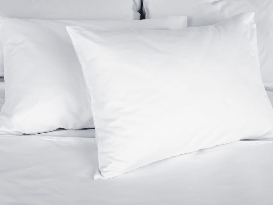 Pillows in Novella apartment at The Originals Hotels