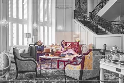 Park Lounge with plush seating, decorative rugs, and a dining table at Park Hyatt Saigon