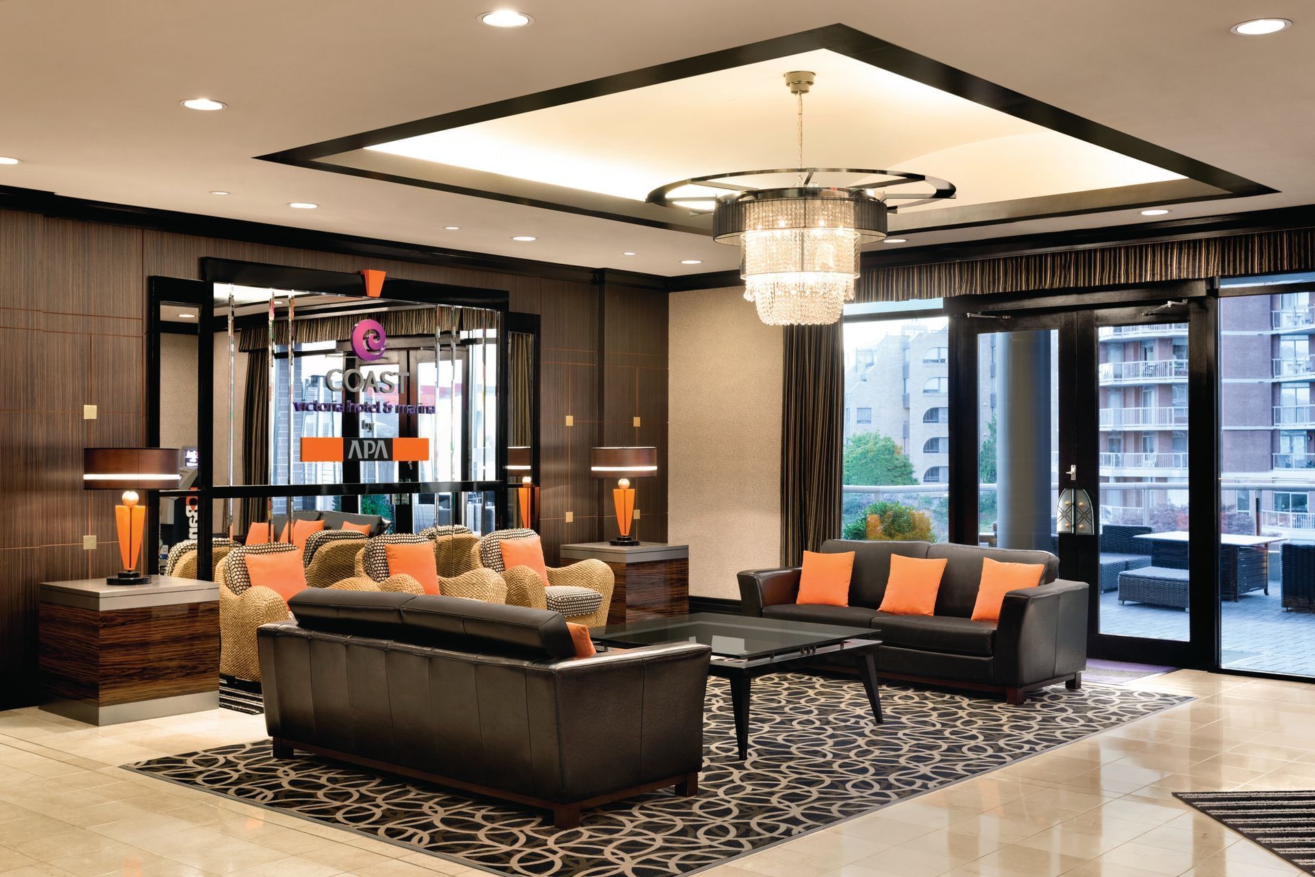 Couches in lobby of Coast Victoria Hotel & Marina by APA