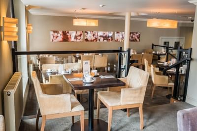 A bistro dining table area at Townhouse Hotel Manchester