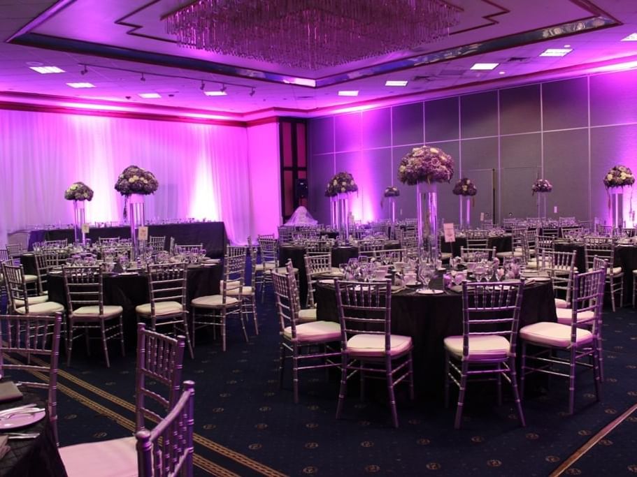 Banquet set-up with flower décor in Montego Suite at Jamaica Pegasus Hotel