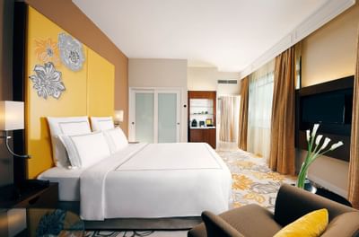 Swiss Executive Room with a king bed at Paradox Singapore
