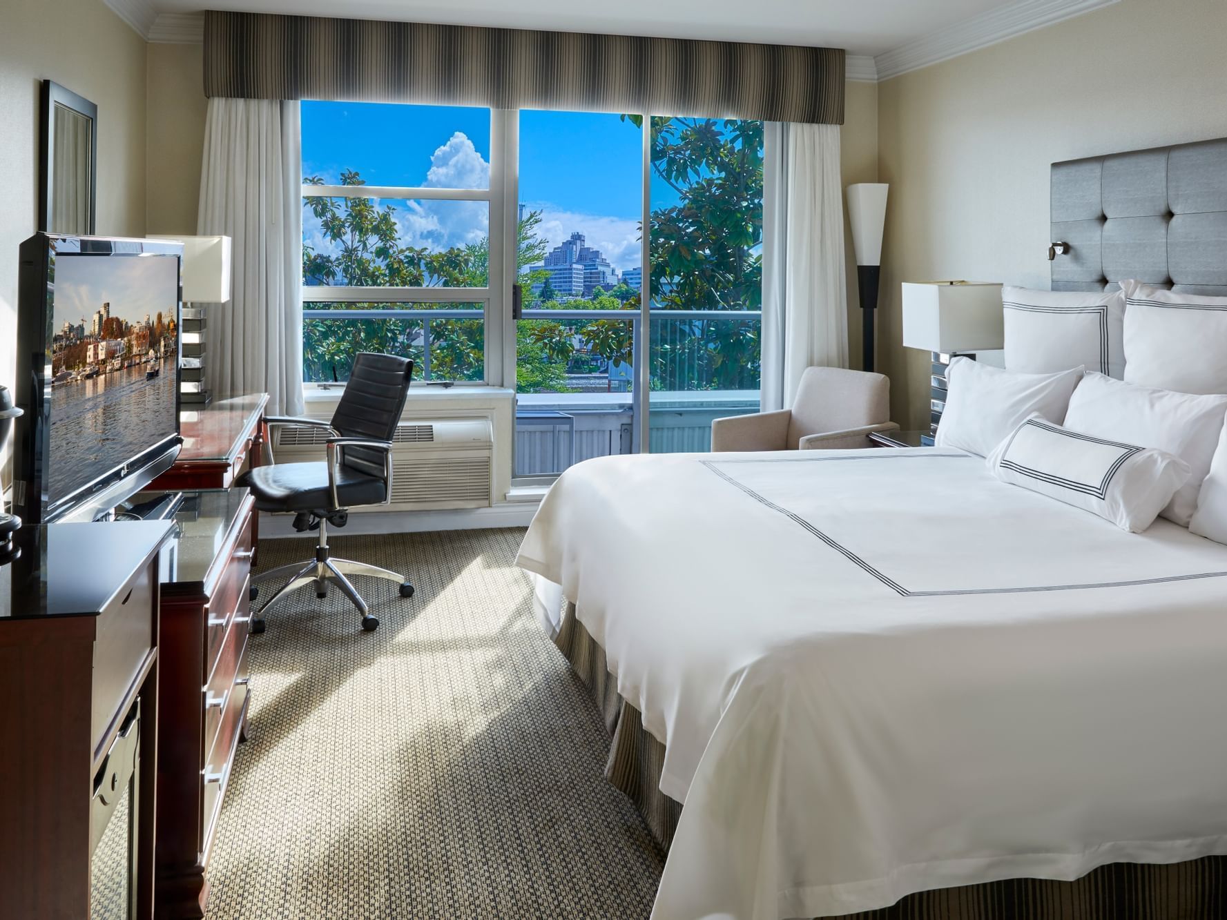 The Premium Balcony King bedroom at Granville Island Hotel