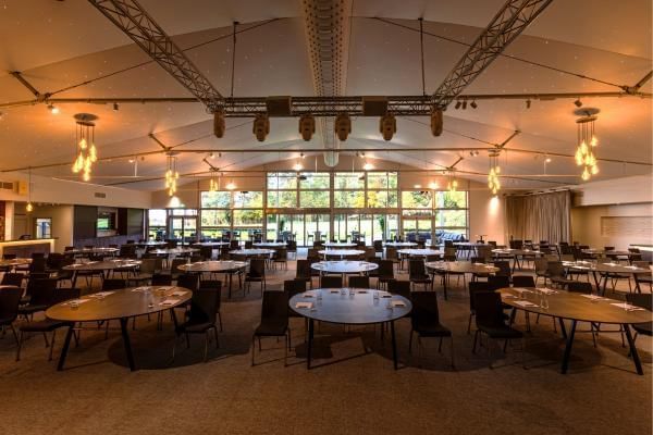 Cabaret Style set up in King Suite, a common corporate seating arrangement