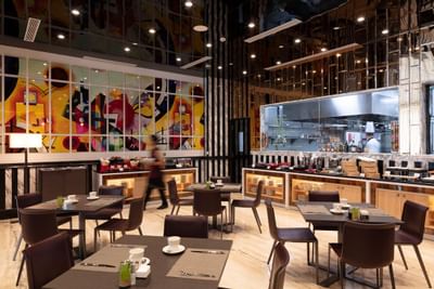 le cafe restaurant interior with square wood tables