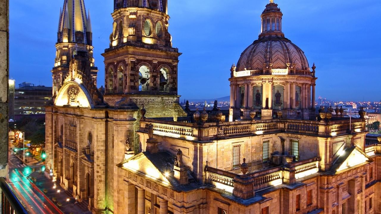 Exterior view of illuminated One Guadalajara Centro Histórico