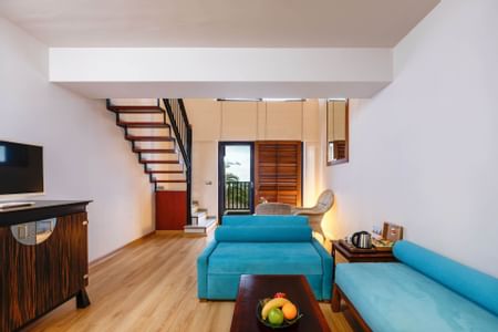 Living room in Hills Suite Seaview Room at Aquaworld Belek