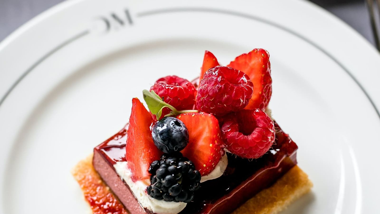 Dessert with berries on top in The Bistro, Domaine de Manville
