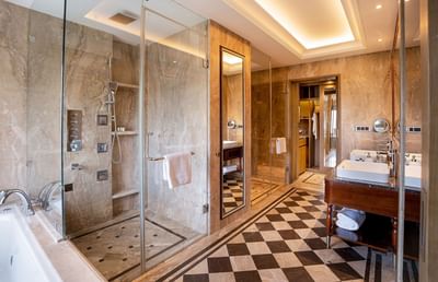 Grande Suite bathroom with vanity & shower area at The Indus Valley hotel stay in Leh