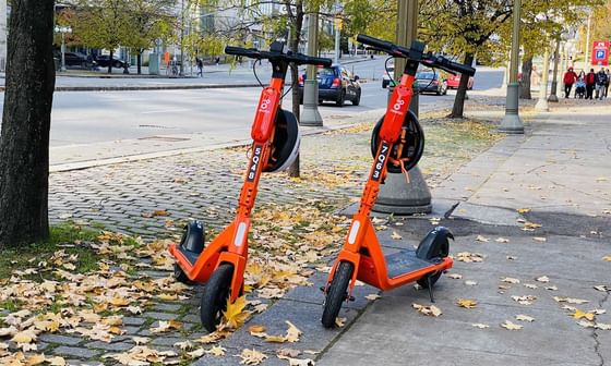 Electronic scooters parked outside the hotel at ReStays Ottawa
