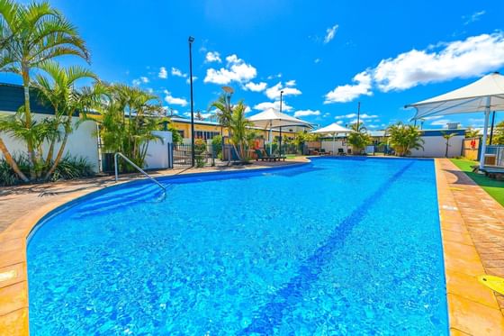 View of the outdoor pool area at Nesuto Curtin Perth Hotel