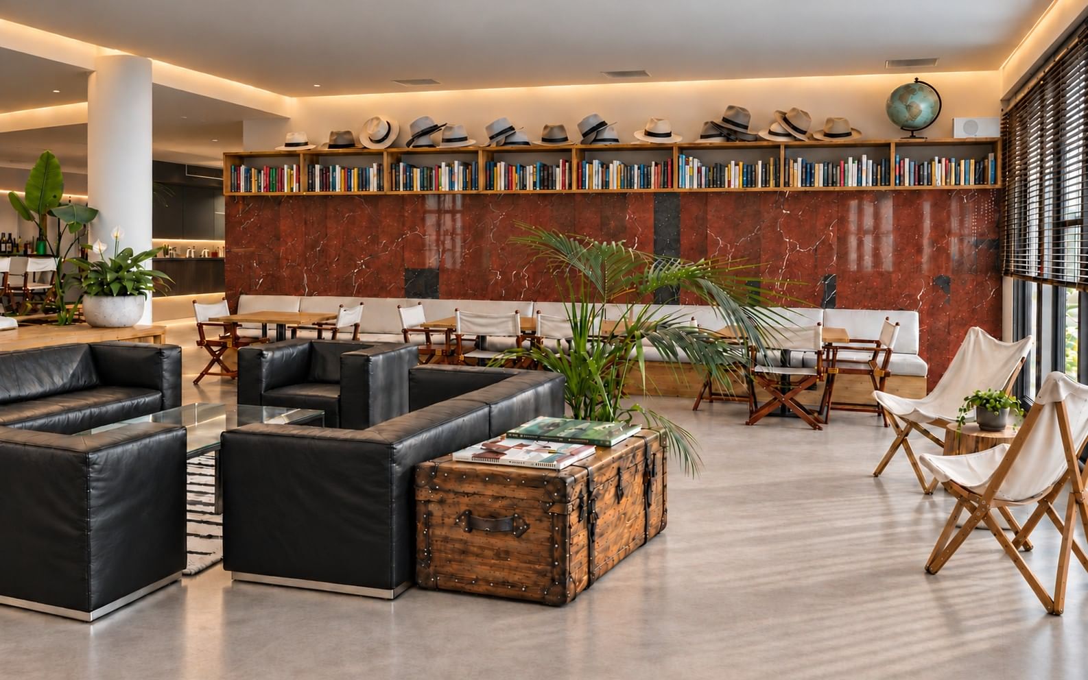 The Montaperti lounge with travel trunks, books and warm Italian textures