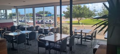 Dining area in Sirocco Bar & Dining at Ocean Centre Hotel