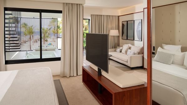 Bed & living area in Luna Suite at Live Aqua Resorts