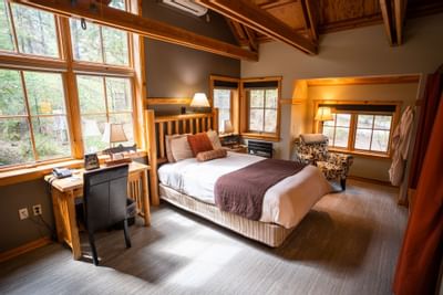 Working desk & king bed in Alcove Room at Sleeping Lady