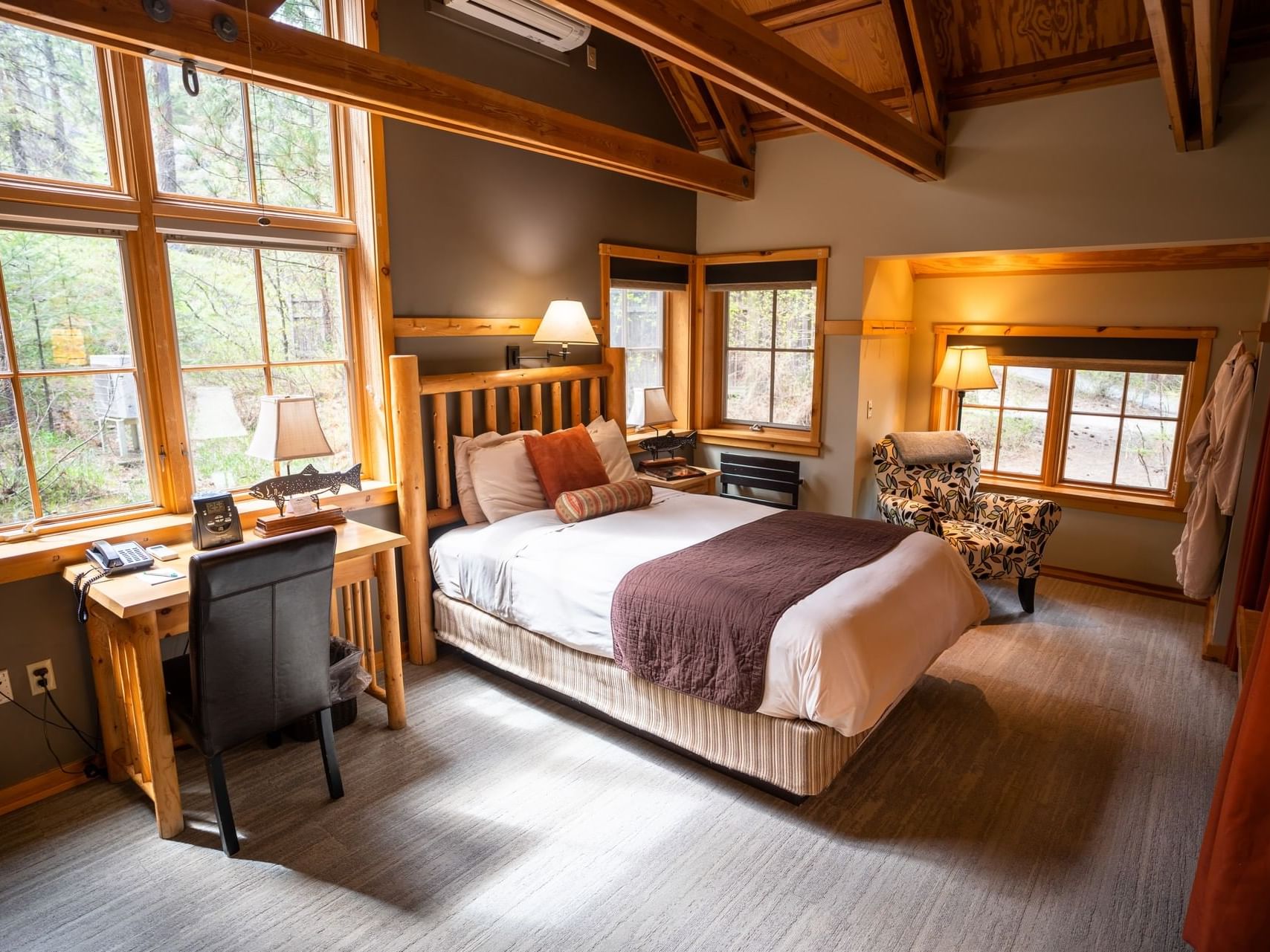Working desk & king bed in Alcove Room at Sleeping Lady