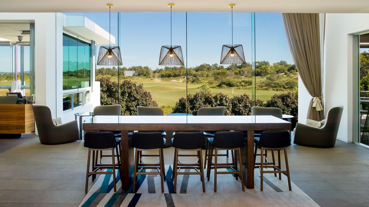 Shallows Bar High Table at Pullman Magenta Shores Resort