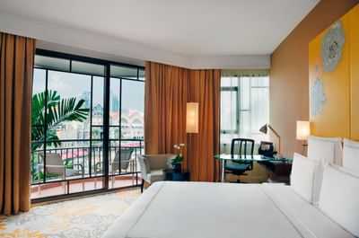 Interior of a bedroom with the city view at Paradox Hotels
