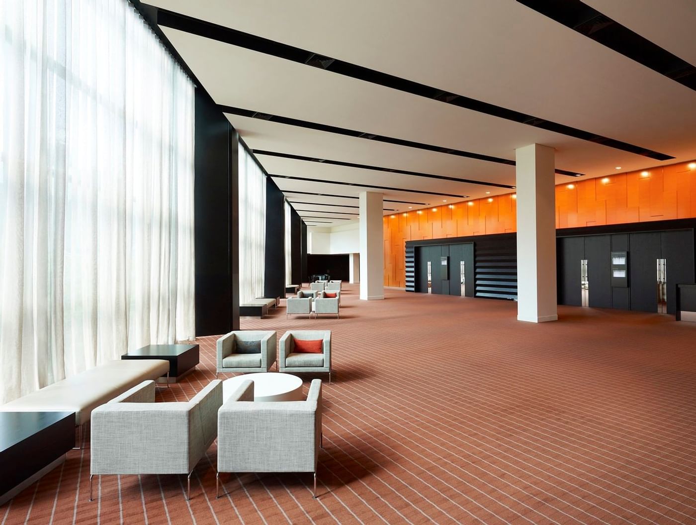 Lobby area with sofa chairs at Crown Hotel Melbourne