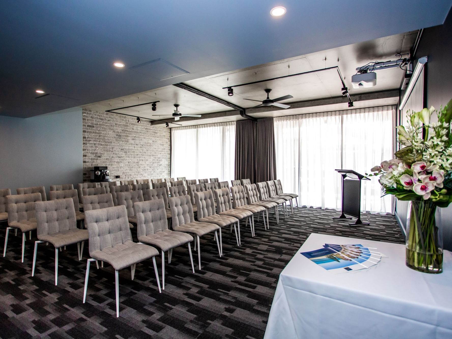 Mcculloch Room with chairs at The Sebel Brisbane Margate Beach