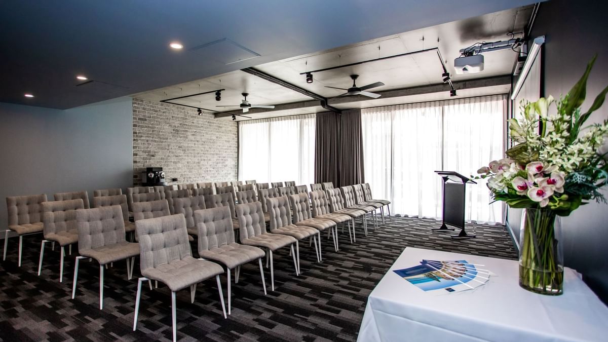 Mcculloch Room with chairs at The Sebel Brisbane Margate Beach