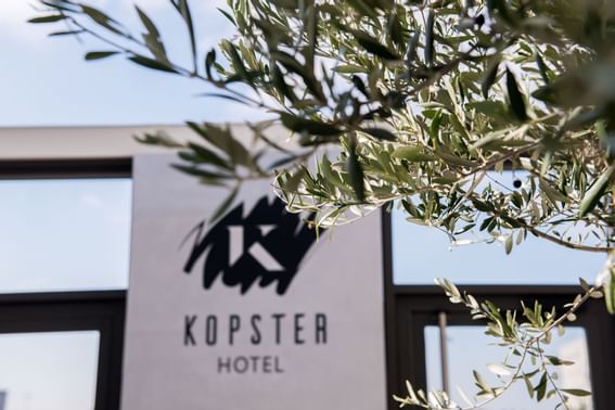 Exterior view of the hotel name sign at Kopster Hotel Lyon