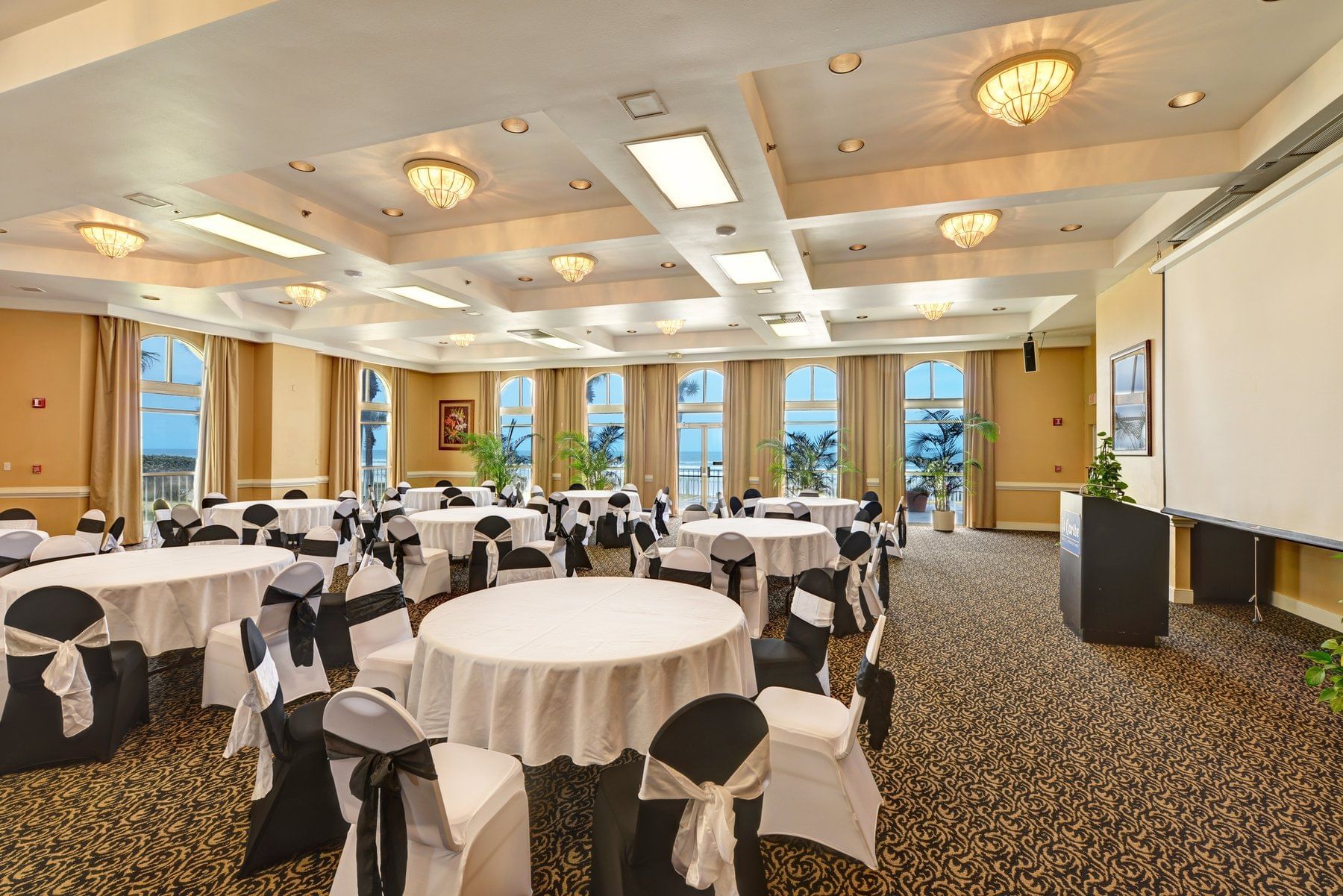 Meeting room with round conference tables.