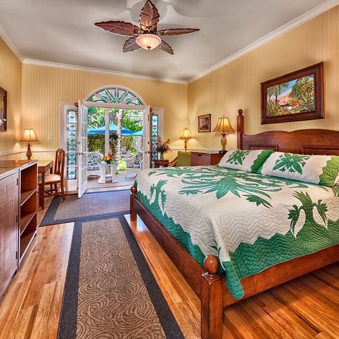 Close-up of the King bed in Lanai Room at The Plantation Inn
