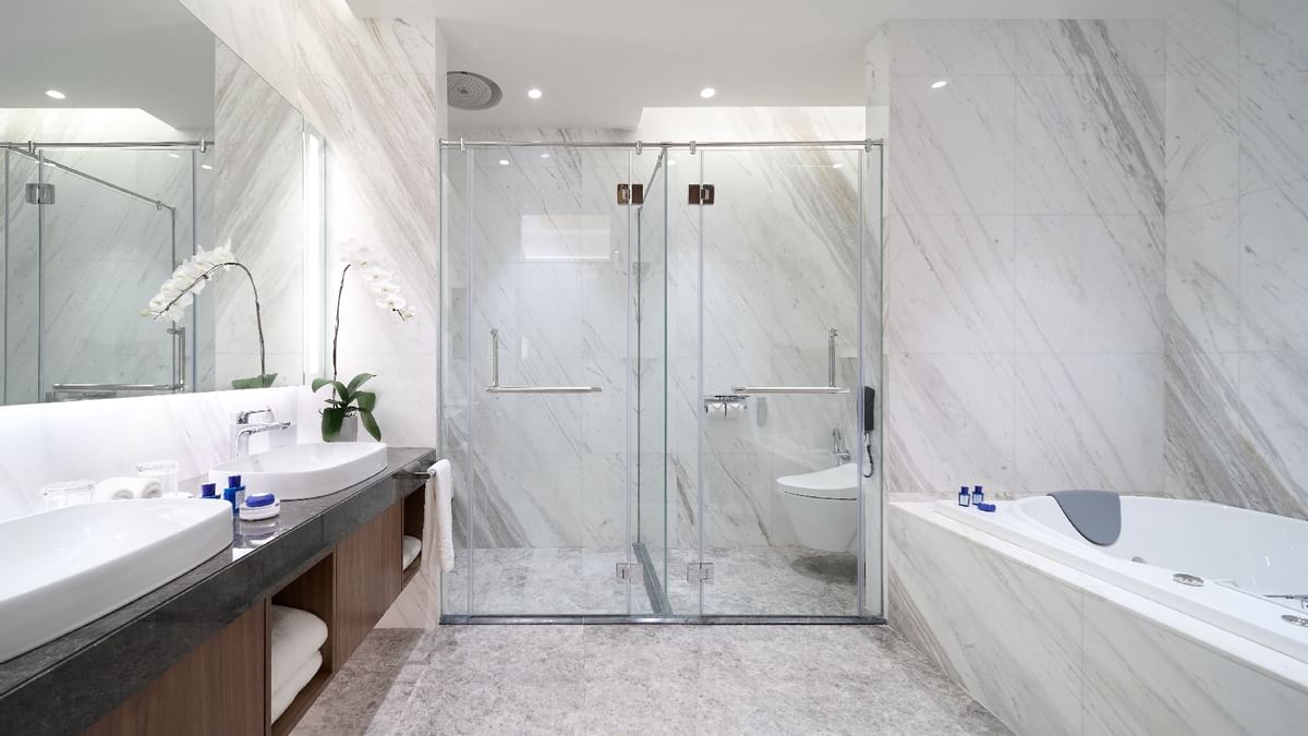 Bathroom with a glassed shower area in Family Suite at Sunway Hotel Big Box