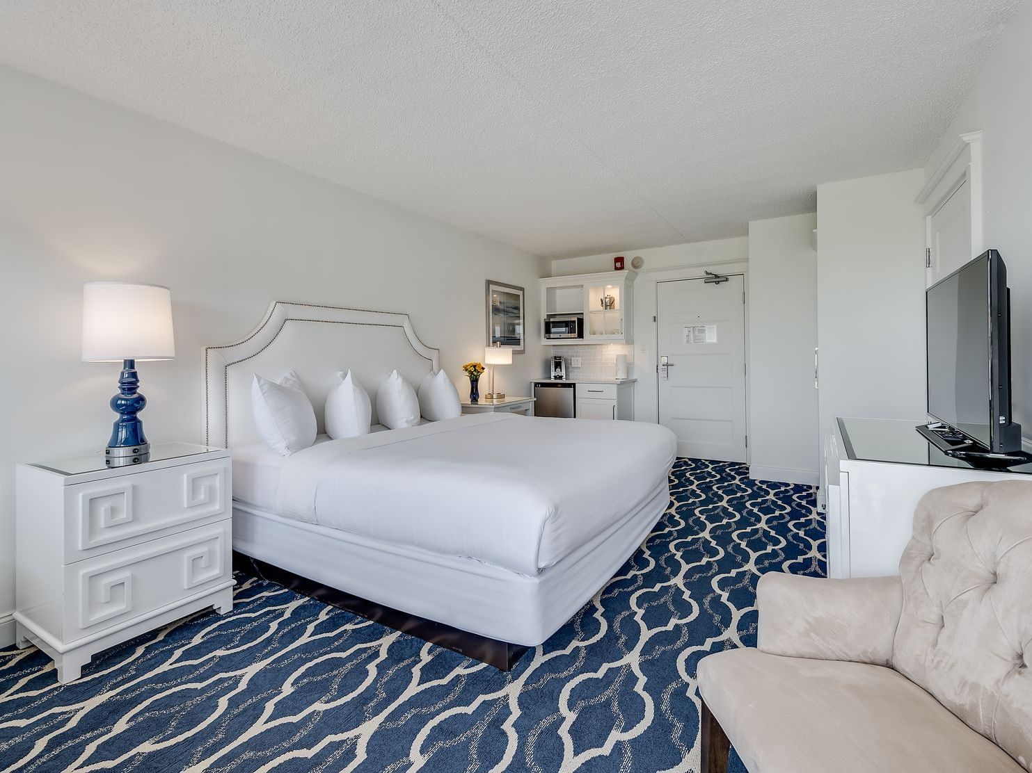 Classic King room with a king bed and TV at ICONA Cape May