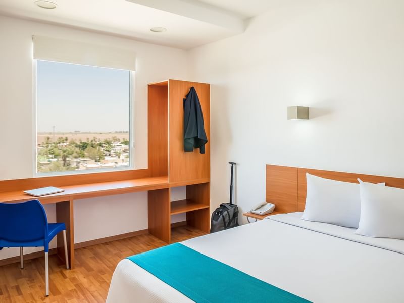 Interior de la habitación Superior 1 queen en One Hotels