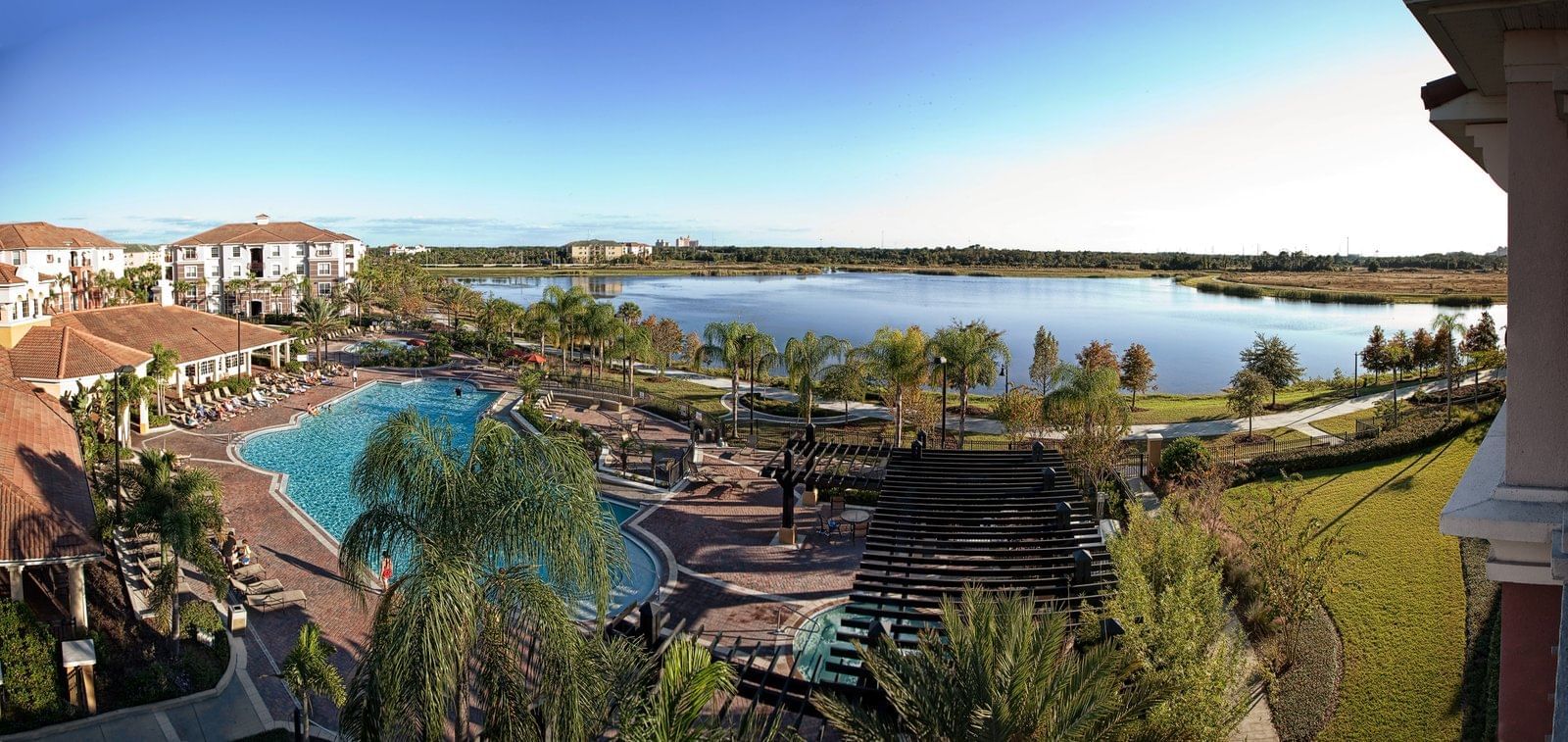 Aerial view of pool and lake