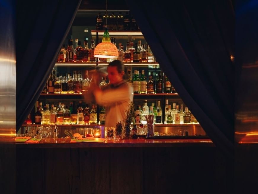 Bartender making cocktails in Bomba at Brady Hotels Jones Lane