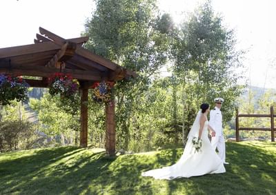 Bride & groom posing at Stein Eriksen Lodge
