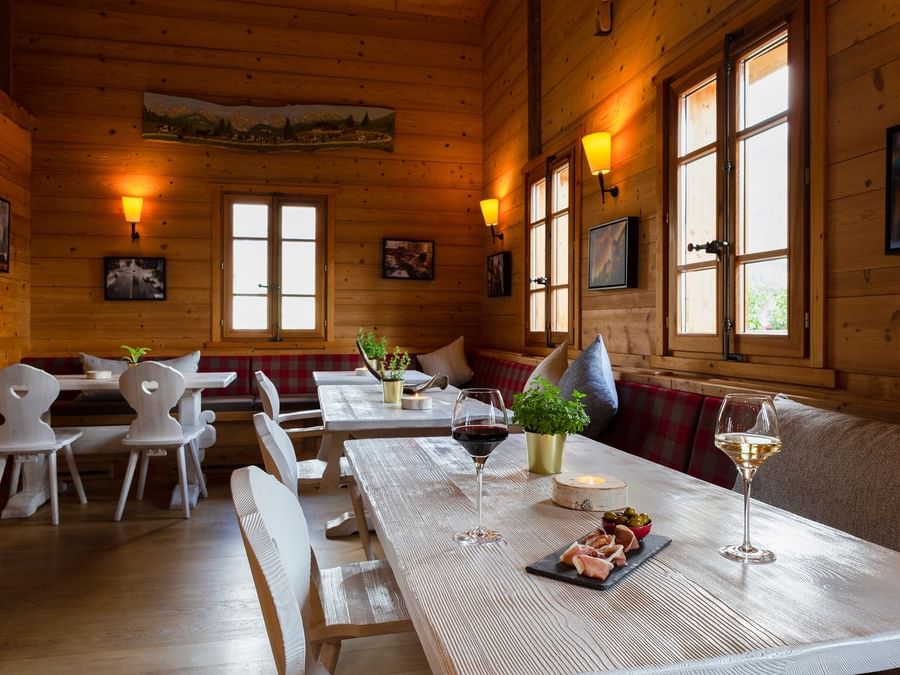 Interior of a restaurant at Chalet Hotel La Marmotte
