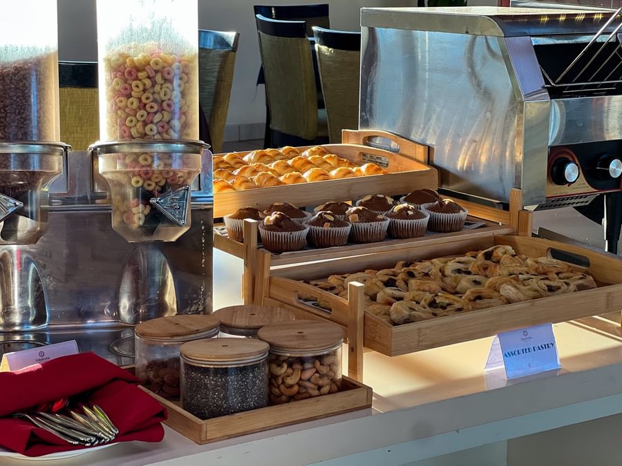 Freshly baked croissants, muffins, and pastries served alongside cereal dispensers at TokaToka Resort Nadi Fiji