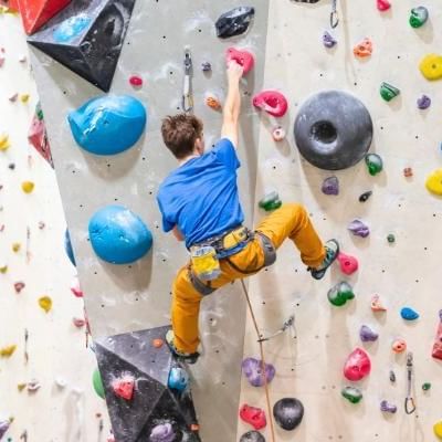 boy rock climbing in wokingham