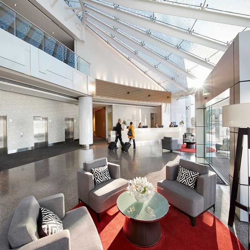 Reception counter with a lobby at Crown Hotels