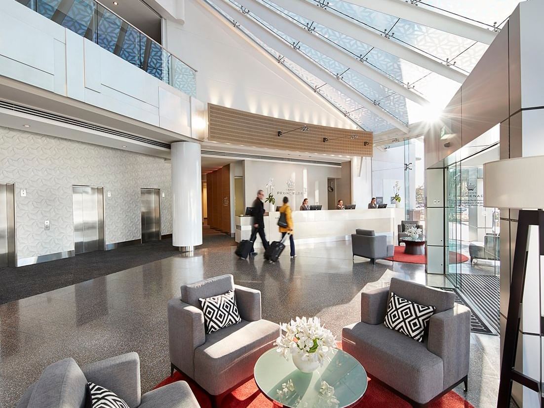 Reception counter with a lobby at Crown Hotels