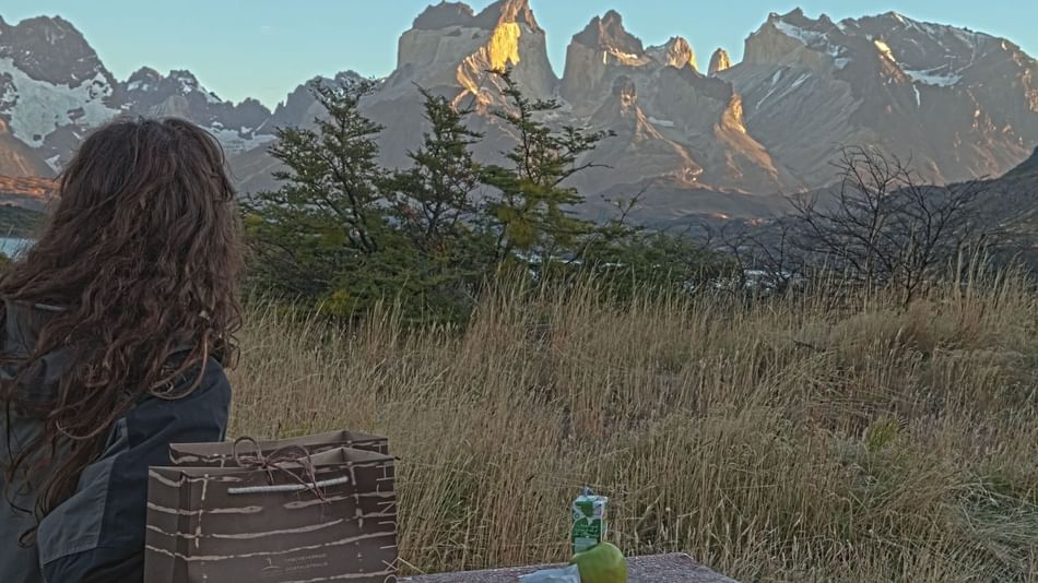 Girl looking over mountains at Hoteles Australis