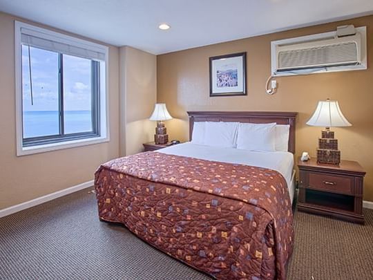 Large bed, 2 bedroom Premium Suite at Legacy Vacation Resorts