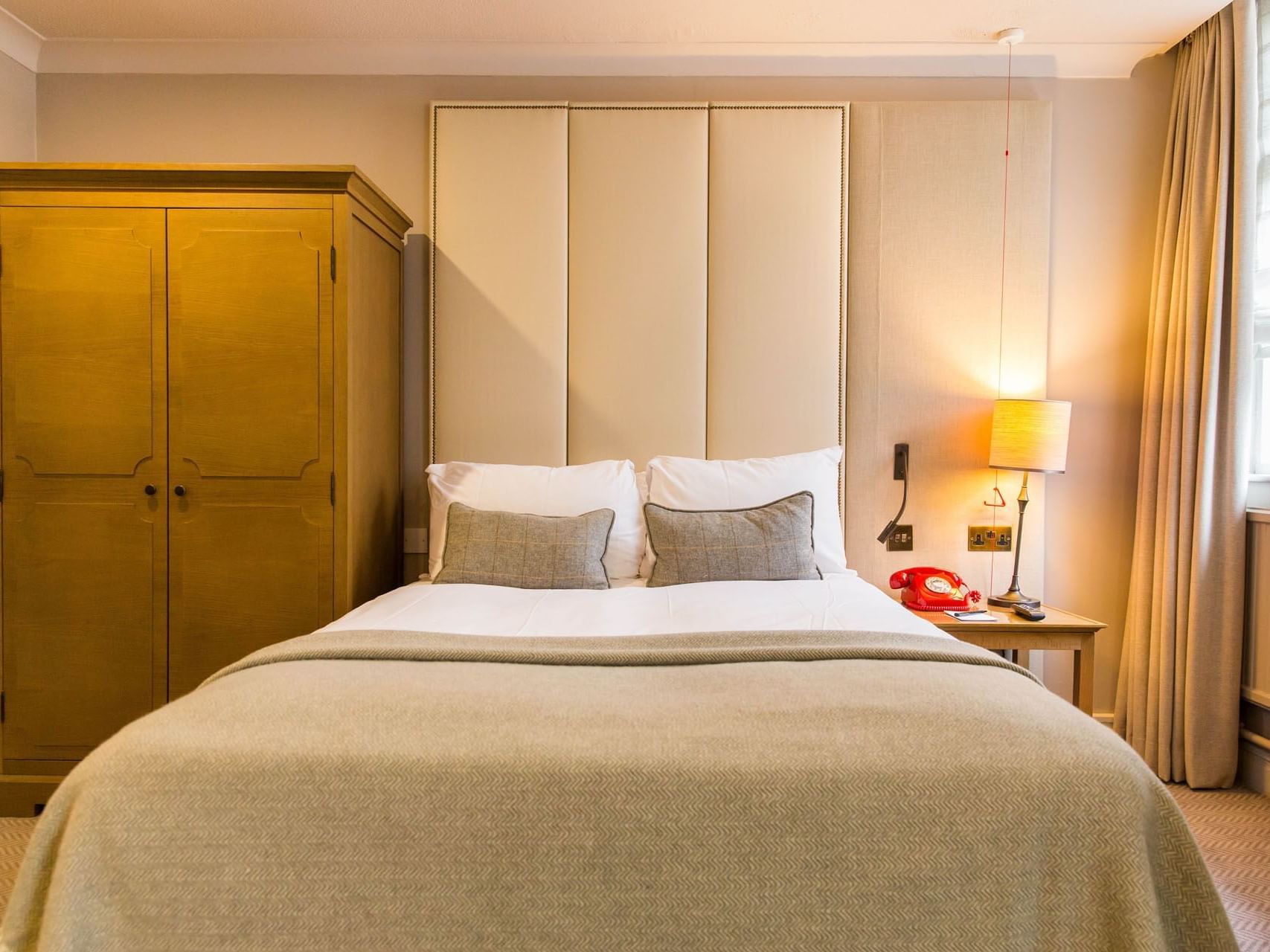 Closet by a double bed in Accessible Bedroom, accommodation in York at The Milner York