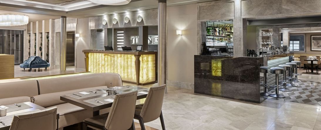 Modern interior with elegant decor and bar counter in Lobby Bar at Titanic Comfort Mitte